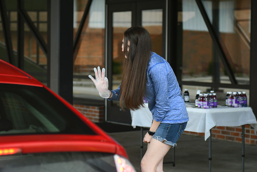 Leslie Potter waves goodbye